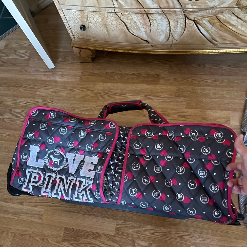Super Rare VS Pink Huge Quilted Rolling luggage.
